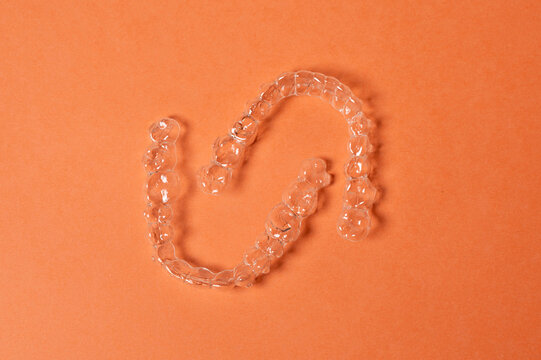 Clear aligners arranging a modern orthodontic teeth straightening treatment