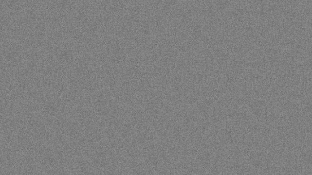 16mm authentic vintage film grain texture overlay subtle noise on grey background. 4k video
