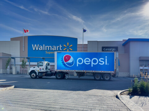 Calgary, Alberta, Canada. September 18, 2026. A Pepsi semi-truck parked in front of a Walmart Supercentre.