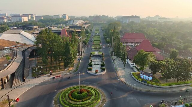 Symmetrical aerial perspective of landscaped UGM Boulevard in Yogyakarta