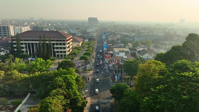 Aerial city view along UGM Boulevard through urban Yogyakarta