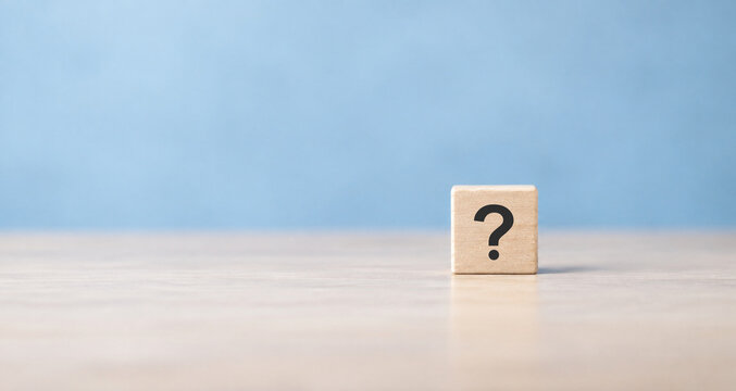 Question mark, Problems and root cause analysis concept. Define problems to find solution. The wooden cube block with question mark sign on grey background and copy space.