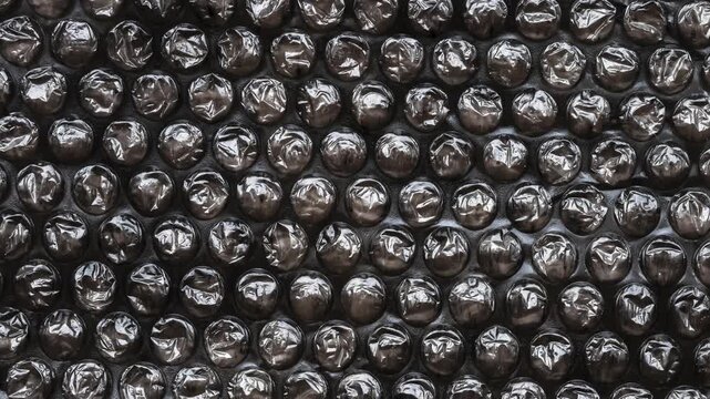 Black Bubble Wrap Texture Background for Packaging and Protection