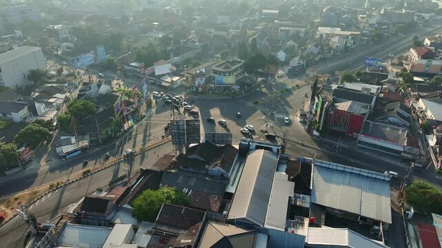 Aerial city panorama overlooking busy crossroads in urban Yogyakarta