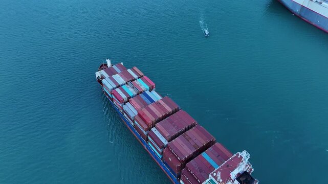 cargo ship carrying container and running for export goods from cargo yard port to custom ocean concept technology transportation. container ship export import shipping service.