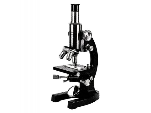 A classic vintage metal microscope isolated on a white background.