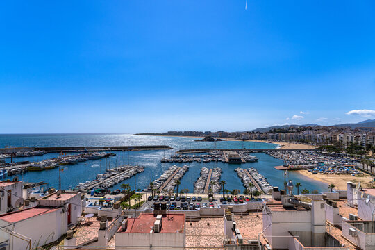 Panorama view of Balearic Sea, Blanes beach, bay and cityscape from the viewpoint of mountain Sant Joan on sunny summer day, Selva, Girona Catalonia, Spain