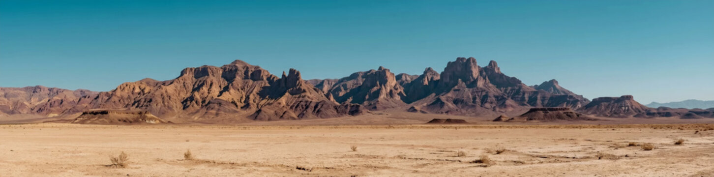 Panoramic view of rocky mountains in a vast dry desert landscape under blue sky. AI generated