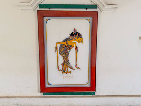 Framed Javanese wayang figure displayed at Yogyakarta Sultan Palace