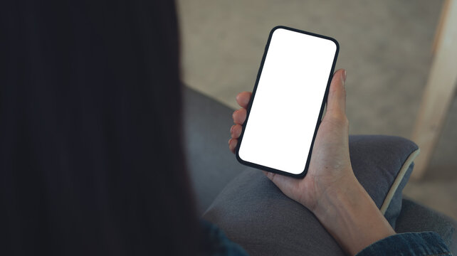 Mockup, woman using smartphone with blank white screen mockup, copy space for advertise text. contact business, social media marketing, closeup