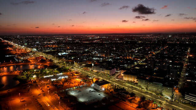 Aerial cityscape  sunset landscape of Atalaia Shore Avenue at Aracaju at Sergipe Brazil. Travel destination. Sunset sky. Sunset skyline cityscape. Coast city landscape. Orange background.
