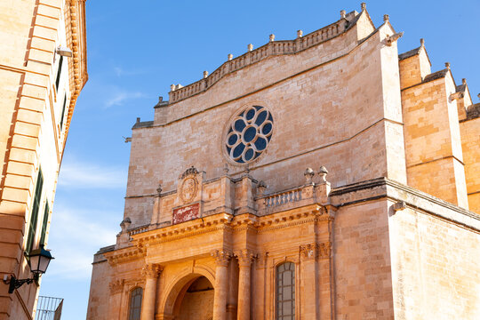 Ciutadella de menorca cathedral facade and rose window under blue sky