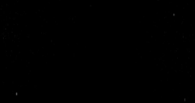 Slow motion floating water droplets on a black background. Premium VFX overlay for cinematic compositing, motion graphics, title animations, trailers and professional visual effects.