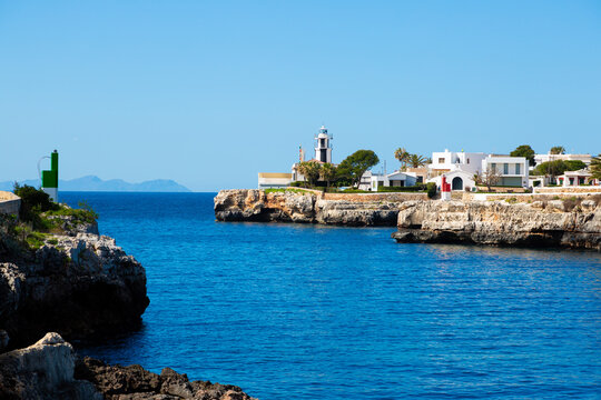 Porto colom coastal town on mallorca with clear blue mediterranean sea