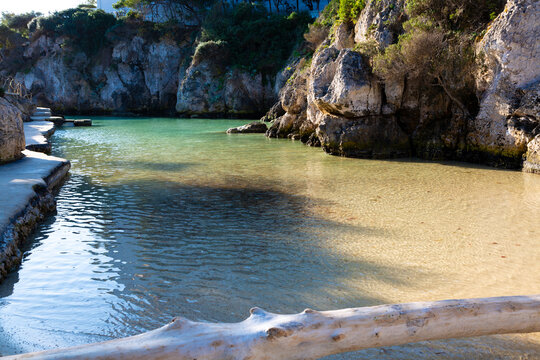 Binibeca cove with turquoise mediterranean sea water