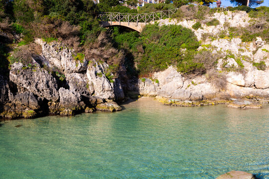 Binibeca cove with turquoise mediterranean sea water