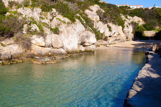 Binibeca cove with turquoise mediterranean sea water
