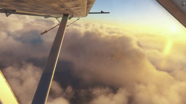 Aerial View From Small Airplane Cockpit Flying Over Thick Clouds