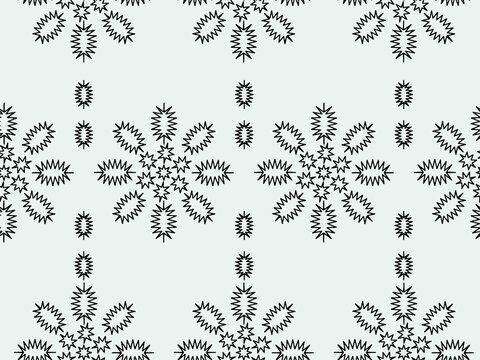 Ornate snowflake motifs in a repeating pattern against a pale background with subtle texture