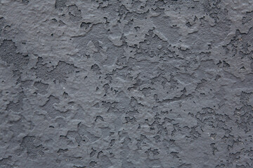 Peeling gray paint texture creating abstract background © Iryna