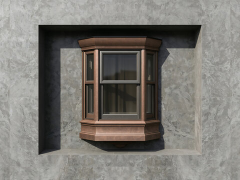 A classic brown bay window with a central sash set into a recessed gray stone wall with visible marble texture and sharp architectural shadow casting
