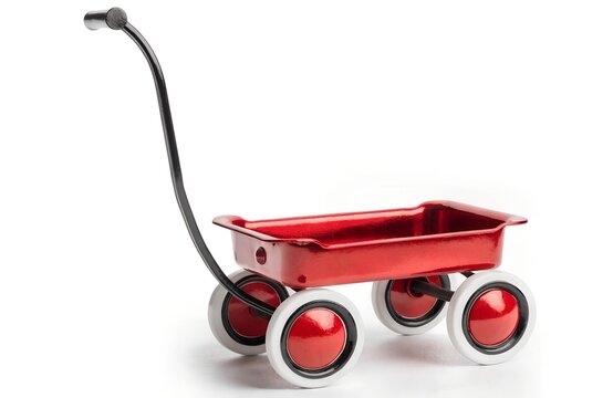 Classic red metal toy wagon on white background with kids toy