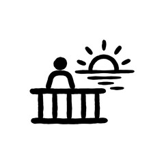 Obraz premium A hand drawn black and white icon of a person leaning on a balcony railing watching the sunset, representing relaxation and quiet moments.