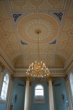 Ornate ceiling with gold chandelier at Newark Town Hall England