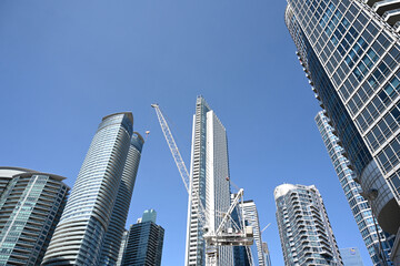 Obraz premium Toronto, Ontario, Canada - June 28, 2026: Construction crane and skyscrapers in Toronto.