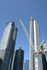 Obraz premium Toronto, Ontario, Canada - June 28, 2026: Construction crane and skyscrapers in Toronto.