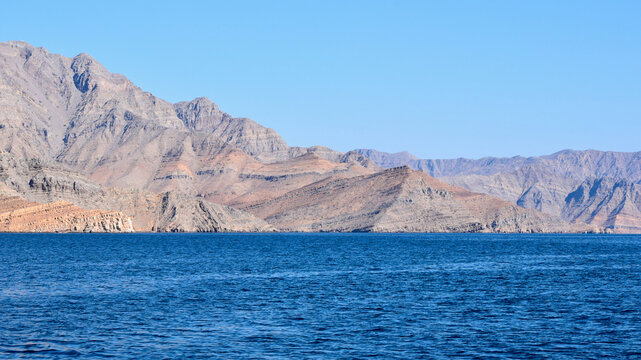 Rocky Desert Mountain Coastline in Fjord on Strait of Hormuz in Musandam, Oman