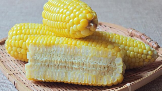 Yellow boiled corn cut lengthwise