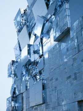 Abstract modern building facade with reflecting mirror glass cubes