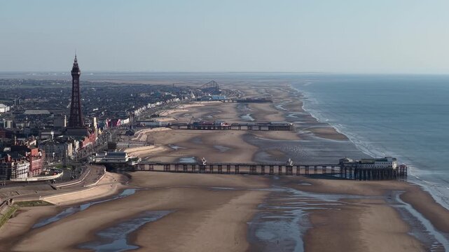 Blackpool Tower and pier from aerial coastline