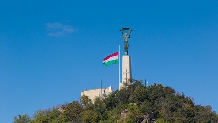 The Liberty Statue stands tall in Budapest, Hungary. © serhii