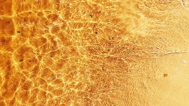 Maldives lagoon shows golden shallows from directly overhead angle