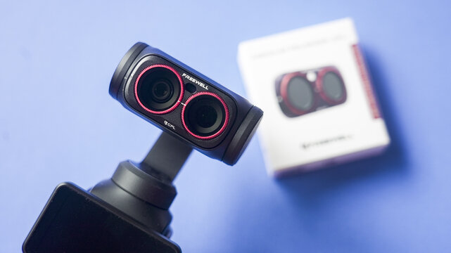 NORWALK, CT, USA - SEPTEMBER 11, 2026: Freewell luna ultra action camera on a gimbal with cpl filters and packaging