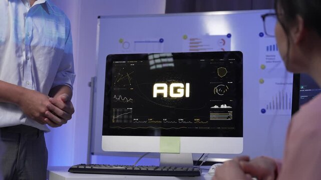 Engineers discussing artificial general intelligence on computer screen
