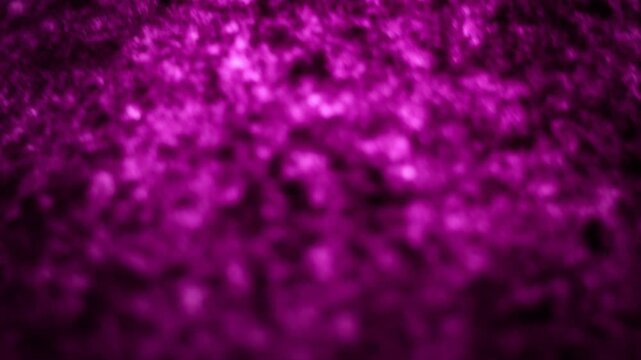 Una toma de cerca de un fondo abstracto de color violeta, morado y rosado con un degradado ligero desenfocado en movimiento