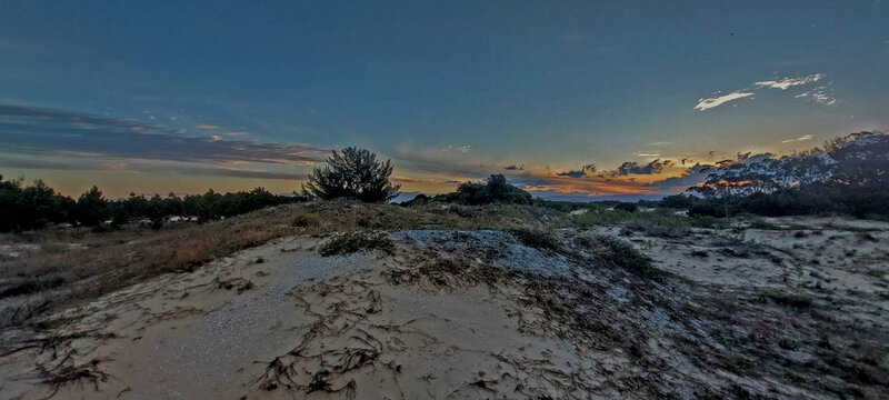 Sunset over the sambaqui dunes in arroio do sal , brazil