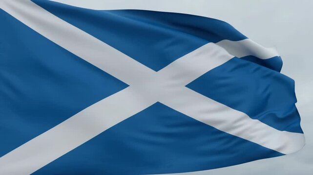 Waving Scottish Flag Against a Cloudy Sky, Representing Scotland's National Identity and Heritage.