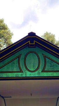Close-up of green geometric gable detail at Yogyakarta Sultan Palace