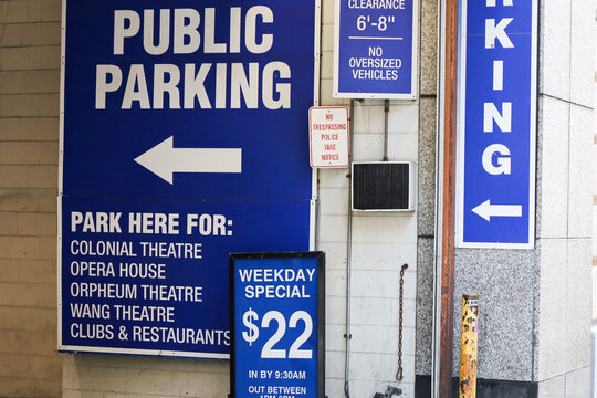 Public Parking Sign Listing Nearby Theaters and Clubs in Downtown Boston