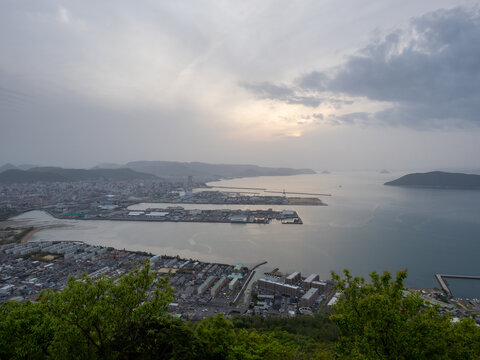 View of Takamatsu city and Seto Inland Sea at dusk from Shishi no Reigan observatory on Yashima - Kagawa prefecture, Japan