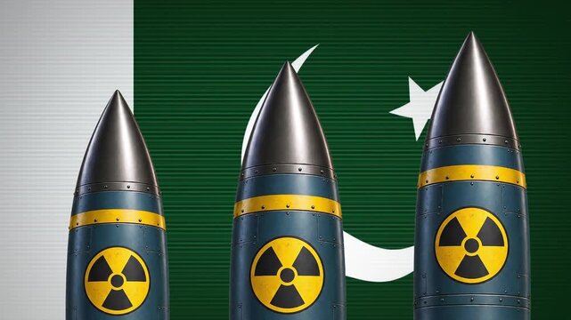 Three nuclear missiles rising against the national flag of Pakistan