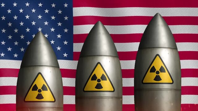 Three nuclear missiles rising against the United States national flag