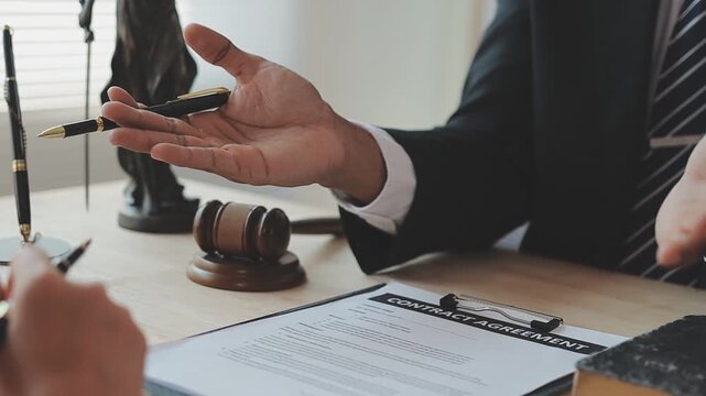 Lawyer explained to the client about the law that must be brought against the court case.