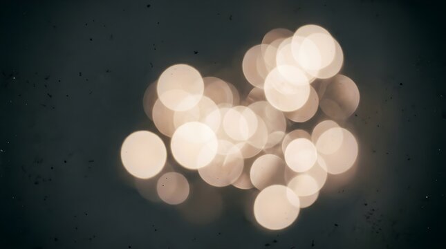 Warm White Bokeh Circles Overlapping on Dark Moody Background