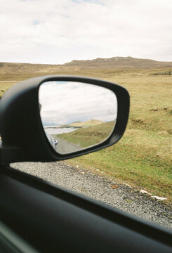 Rural Landscape Reflected in Car Side Mirror