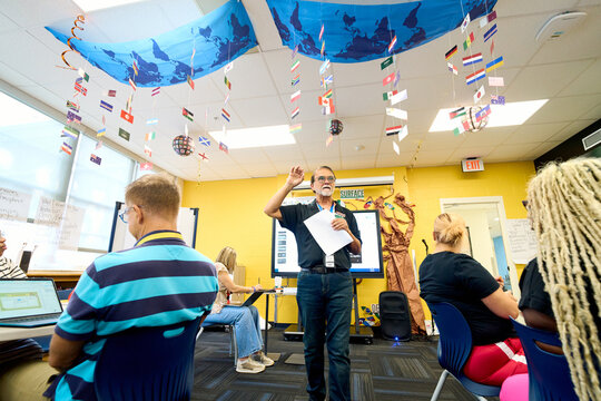 Teacher leading an education workshop
